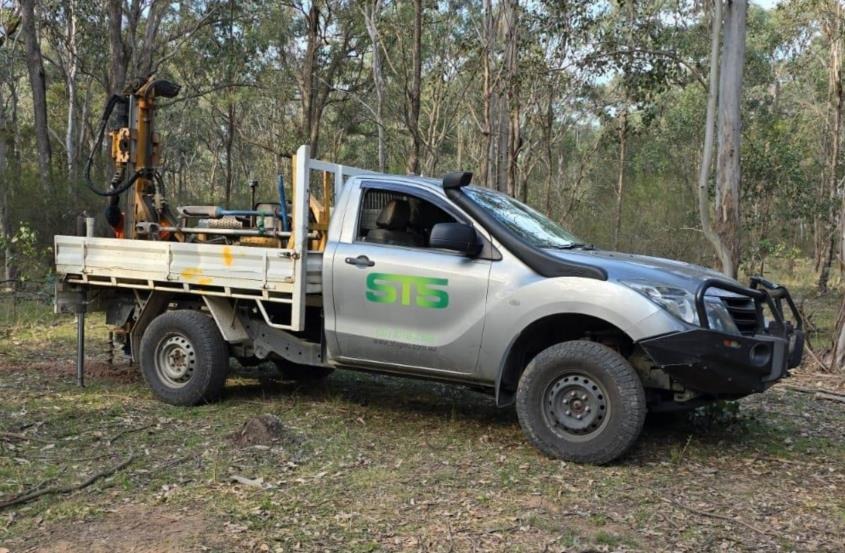 Silver STS utility vehicle carrying the Christie auger and DCP rig in bushland