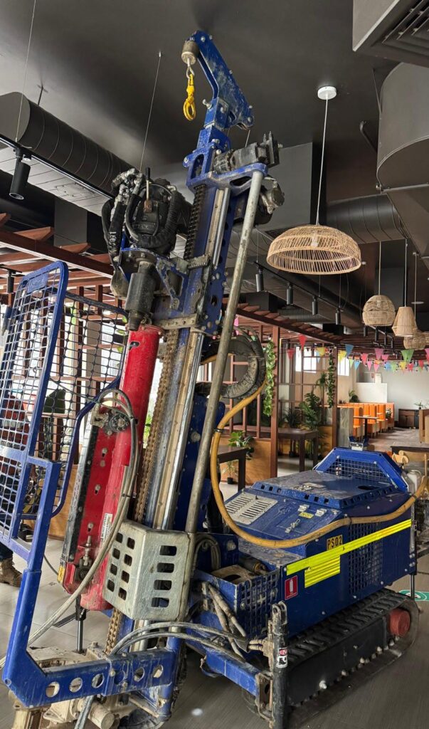 Christie CE108 drilling rig set up for drilling inside a building